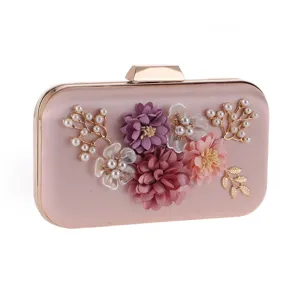 Elegant women evening clutch bag with artificial flowers and pearls for wedding parties.
