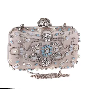 Elegant satin evening clutch bag with sparkling rhinestones, pearls and floral metal clasp.