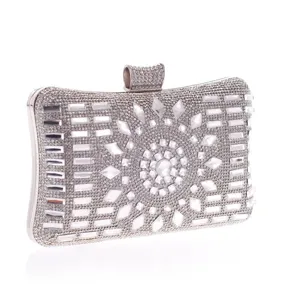 Elegant silver rhinestone evening clutch bag with sparkling crystal mosaic design for formal events.