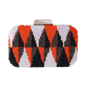 Close-up detail of the colorful beaded clutch purse, showing intricate geometric beadwork.