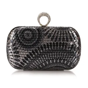 Elegant black sequin evening clutch bag detail showing sparkling rhinestones round top ring.