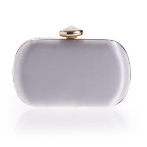 Silver satin evening clutch bag with crystal clasp and gold frame for women parties.