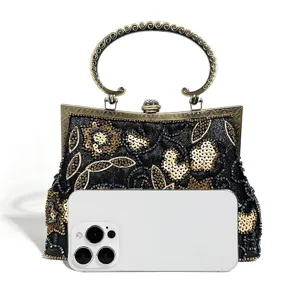 Vintage sequin evening handbag with metal handle, elegant beaded kiss lock clutch bag.