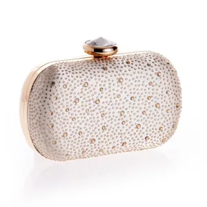 Sparkling rhinestone evening clutch bag for women, elegant gold metallic frame wedding purse.