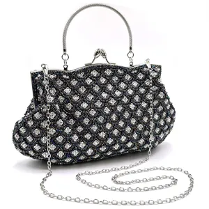 Exquisite beaded evening clutch bag with chain strap, fish scale pattern, elegant design.