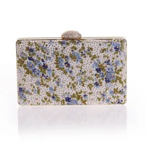 Elegant floral rhinestone evening clutch bag with gold frame, perfect for parties and weddings.