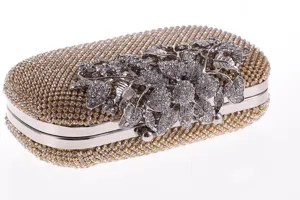 Detailed view of the sparkling rhinestone evening clutch with stunning crystal floral clasp.