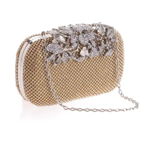 Stunning rhinestone evening clutch bag with crystal floral clasp and detachable chain strap.