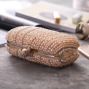 Handcrafted pearl rhinestone evening clutch bag for women elegant wedding party purse.