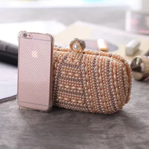 Handmade pearl rhinestone evening clutch bag for women, elegant beaded party bridal bag.