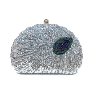 Vintage sequin beaded evening clutch bag with elegant peacock feather pattern and gold clasp.