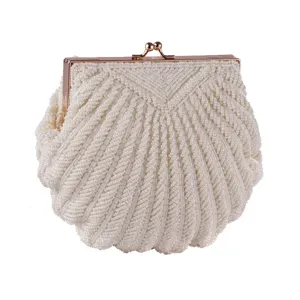 Ivory beaded shell clutch bag, exquisite handmade pearl evening bag with gold metal clasp.