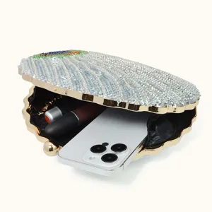 Exquisite beaded evening clutch bag detail showing interior capacity and elegant sequins.