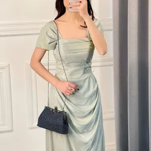 Elegant dark blue beaded evening clutch bag with metal chain strap for women parties.