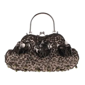 Vintage Pailletten Perlen Abendtasche mit Metallgriff und floralen Verzierungen.