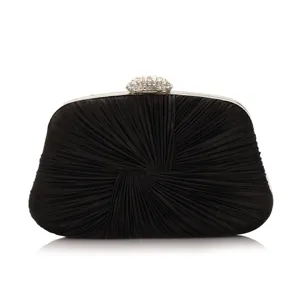 Detailed closeup of the elegant black pleated evening clutch with sparkling rhinestone clasp.