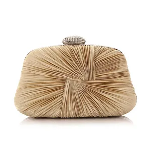 Gold pleated satin evening clutch detail showcasing the delicate crystal clasp and texture.