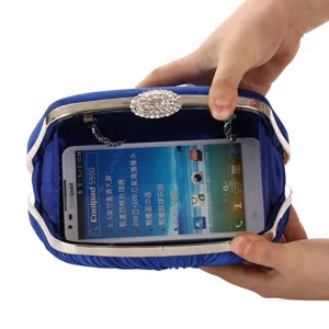 Elegant blue satin pleated evening clutch bag detail view showing inner capacity.