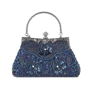 Detailed view of the dark blue beaded evening bag showcasing intricate sequin flower patterns.