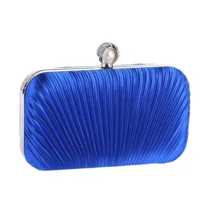 Elegant royal blue pleated evening clutch bag with rhinestone pearl clasp for women party.