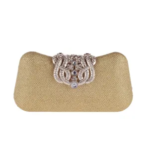Gold rhinestone evening clutch bag with crystal clasp hard shell party purse detail view
