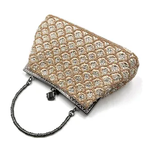 Stunning sequin beaded evening clutch bag with fish scale pattern and metal top handle.