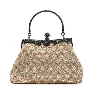 Vintage style beaded evening handbag featuring exquisite fish scale patterns and metal handle.