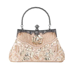 Exquisite beaded evening bag with floral embroidery, elegant metallic handle and clasp frame.