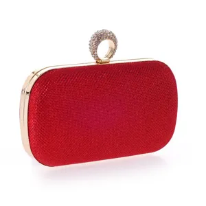 Elegant red evening clutch bag with sparkling rhinestone ring handle and gold frame for women.