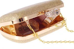 Gold glitter evening clutch bag with rhinestone ring handle and chain strap for women party.