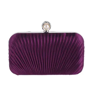 Purple pleated evening clutch bag with pearl rhinestone clasp for women's party wear.
