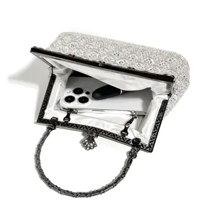 Elegant sequin embroidered evening clutch bag with metal handle for women party.