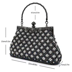Vintage beaded evening bag with rhinestone embellishments, elegant metal frame clutch purse party.