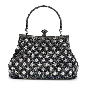 Bead embroidery evening bag luxury clutch purse with metal handle and rhinestones detail close-up