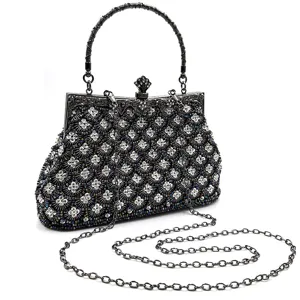 Elegant beaded evening clutch bag with rhinestones, metal frame and chain strap for women.