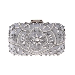 Exquisite silver evening clutch bag detail, handmade rhinestones and pearls decoration.