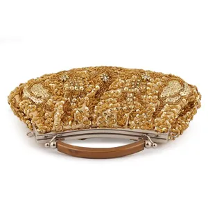 Vintage gold sequin beaded clutch bag evening purse detail with metallic frame and handle.