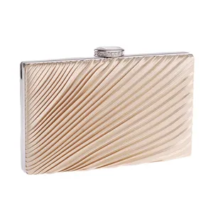 Champagne pleated evening clutch bag with sparkling crystal clasp and silver metal frame detail.