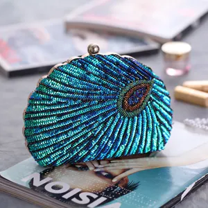 Exquisite peacock sequin beaded evening clutch bag, elegant shell shape with metal clasp.