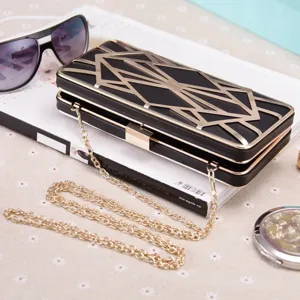 Schwarz goldene geometrische Abendtasche Detail, stilvolle Damen Umhängetasche Clutch Party.