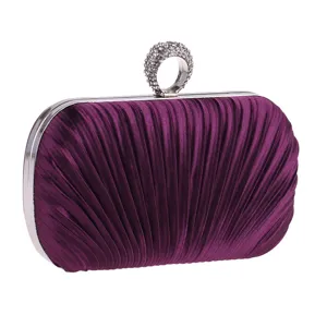 Purple pleated evening clutch bag with sparkling rhinestone ring clasp for women detail view.
