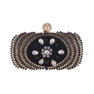 Elegant black beaded evening clutch bag with crystal and pearl clasp for women party.
