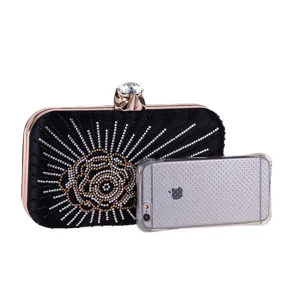 Elegant black rhinestone evening clutch bag with crystal clasp and gorgeous crystal floral design.