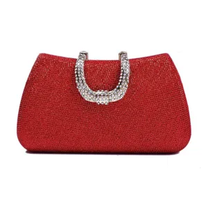 Elegant red glitter evening clutch bag with sparkling rhinestone metal handle for women.