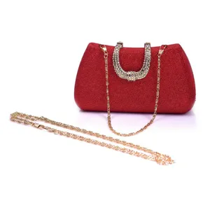 Red glitter evening clutch bag with rhinestone handle and gold chain strap for women party.