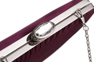 Purple satin evening clutch bag with metallic frame and crystal clasp detail for women events.