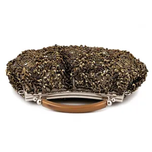 Detailed view of vintage beaded evening clutch bag with exquisite gold embroidery and retro handle.
