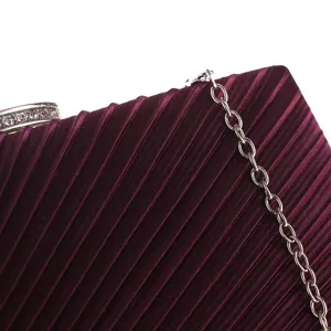 Dark purple pleated evening clutch bag featuring a silver metal chain and sparkling rhinestones.