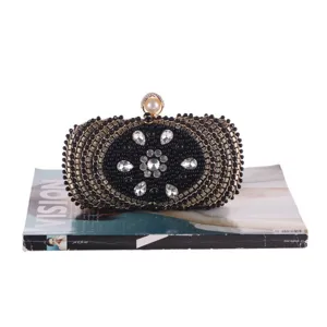Black beaded rhinestone evening clutch bag with pearl clasp and elegant floral crystal design