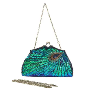 Close-up detail of the vintage sequin peacock evening clutch bag with metallic kiss-lock and chain.